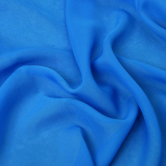 The fabric is chiffon with a multi-pattern design т/блакитний, фото 1