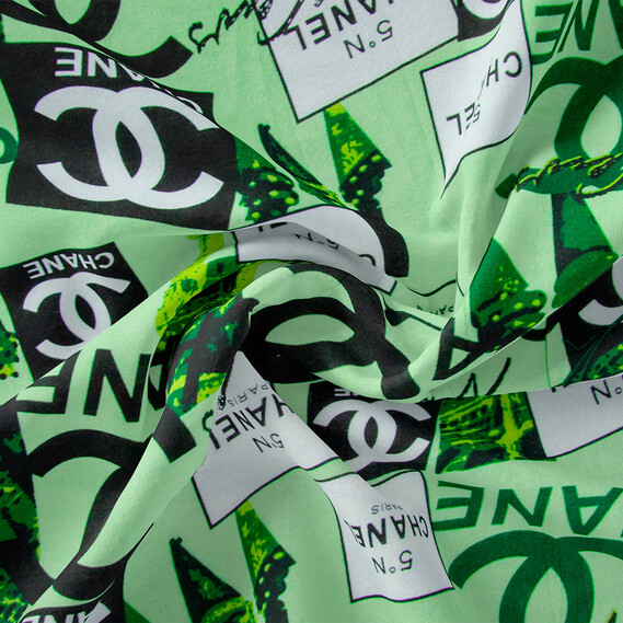 Тканина плательна віскоза штапель Бренд 115 гр/м2 Chanel салат, Написи, фото 1