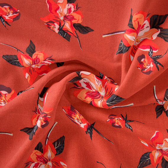 Тканина плательна штапель з малюнком лілейник теракот, фото 1