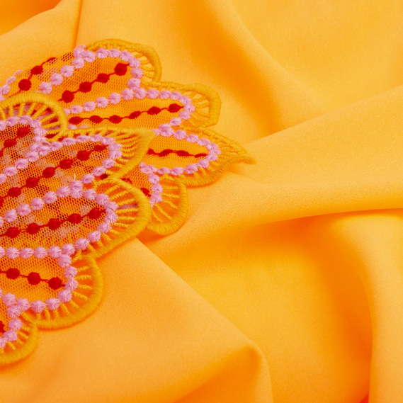 The fabric is chiffon with a moss crepe texture неон помаранч, фото 3