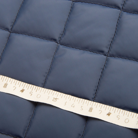 Тканина підкладкова стьобана утеплювач 7,5x7,5 см, синтепон 100 + спанбонд, плащова однотонна, 140 см, 210 гр/м2 сіра, фото 4 Тканина підкладкова стьобана утеплювач 7,5x7,5 см, синтепон 100 + спанбонд, плащова однотонна, 140 см, 210 гр/м2 сіра, фото 4