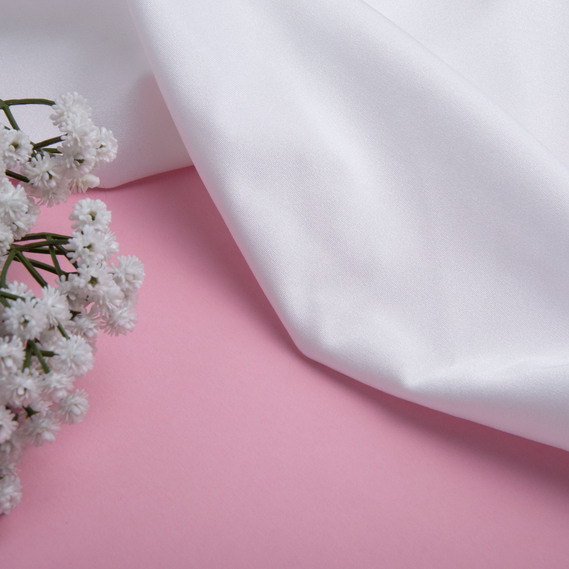 Ткань трикотаж Бифлекс 200 гр/м2 стрейчевая эластичная блестящая для купальников и спортивной одежды молоко, фото 3