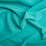 Ткань трикотаж Бифлекс матовый 194 гр/м2, эластичная для купальников, леггинсов, спортивной одежды бірюза, фото 2 Ткань трикотаж Бифлекс матовый 194 гр/м2, эластичная для купальников, леггинсов, спортивной одежды бірюза, фото 2
